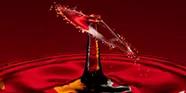 fluids water splash with red backdrop