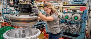 Sonya working on a transmission unit