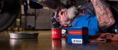 Service technician under vehicle