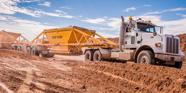 trucking near a construction site