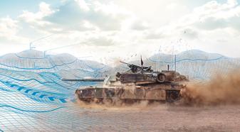 An Abrams tank is moving to the left of the screen. Dust is shown behind it and under the tracks. There are hills in the background that have blue line overlays to show movement.