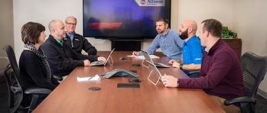 Allison employees in a conference room