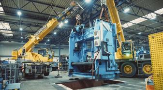 Cranes being operated in a factory