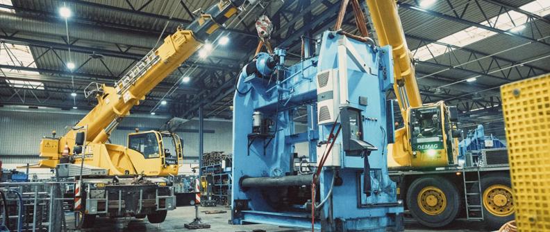 Cranes being operated in a factory