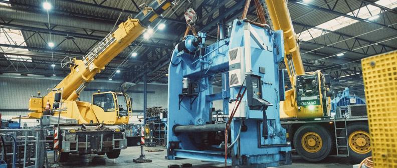 Cranes being operated in a factory