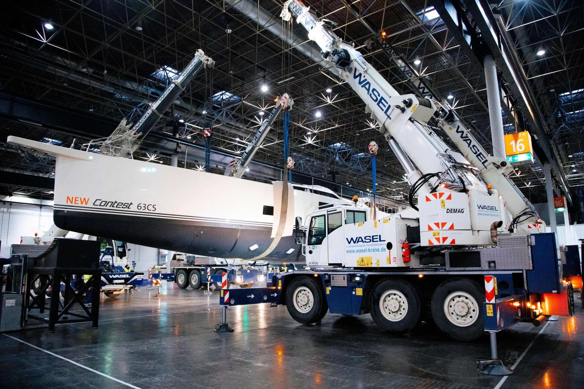 Lifting luxury yachts with Tadano AC 45 City Cranes with Allison