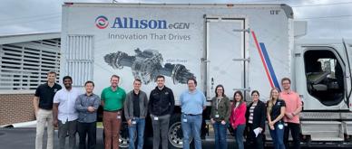 Group of Allison in front of a truck outside