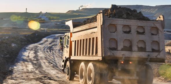 A mining truck drives in China carrying a load.