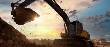 excavator at sandpit during earthmoving works in the construction site.