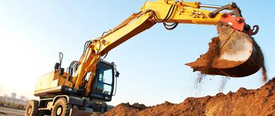 wheel loader excavator machine loading doing earthmoving work at sand quarry