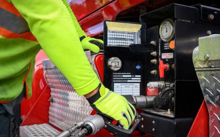 A driver fuels up his truck.